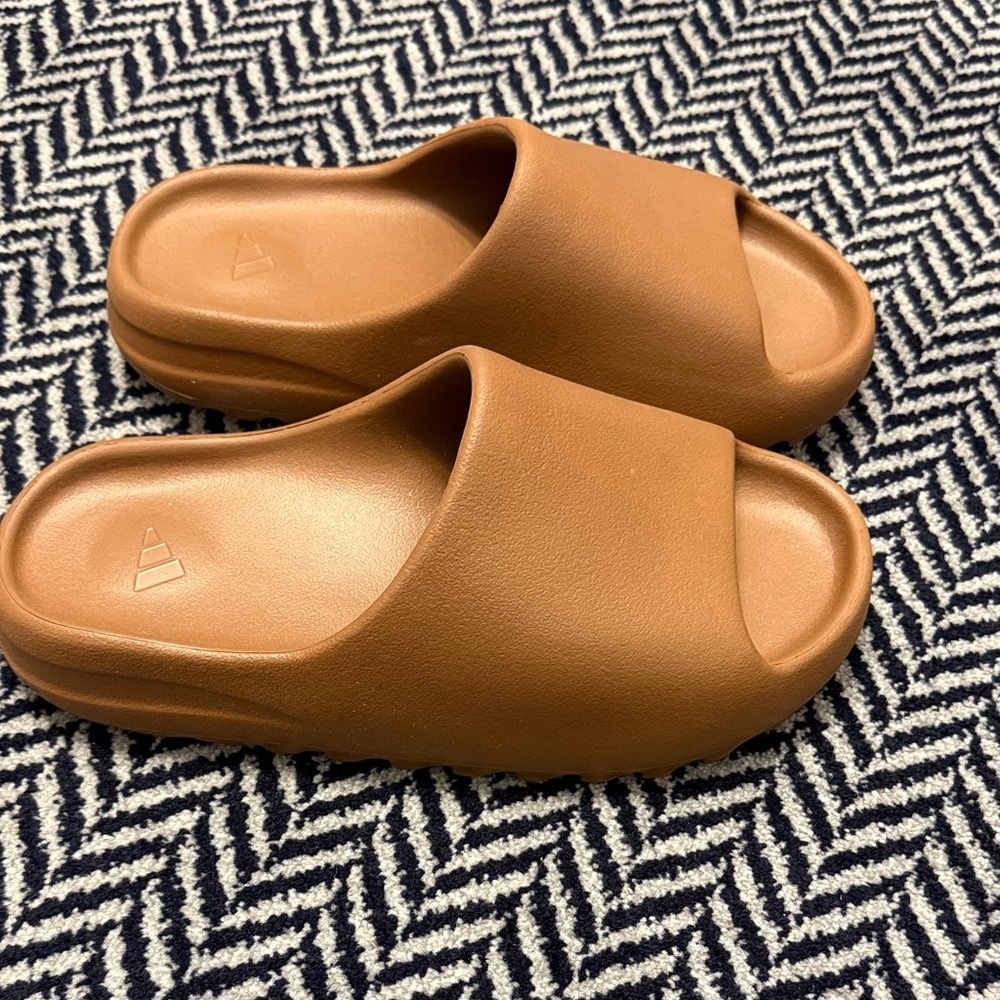 Yeezy Slide Sandals - size 9- never worn- only to try on and didn’t fit.
